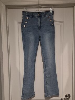 High-Rise Light Blue Flare Jeans with Decorative Buttons